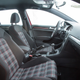 Illustration for article titled This Is The Woman Who Gave Us The Volkswagen GTI's Golf Ball Shifter And Plaid Seats
